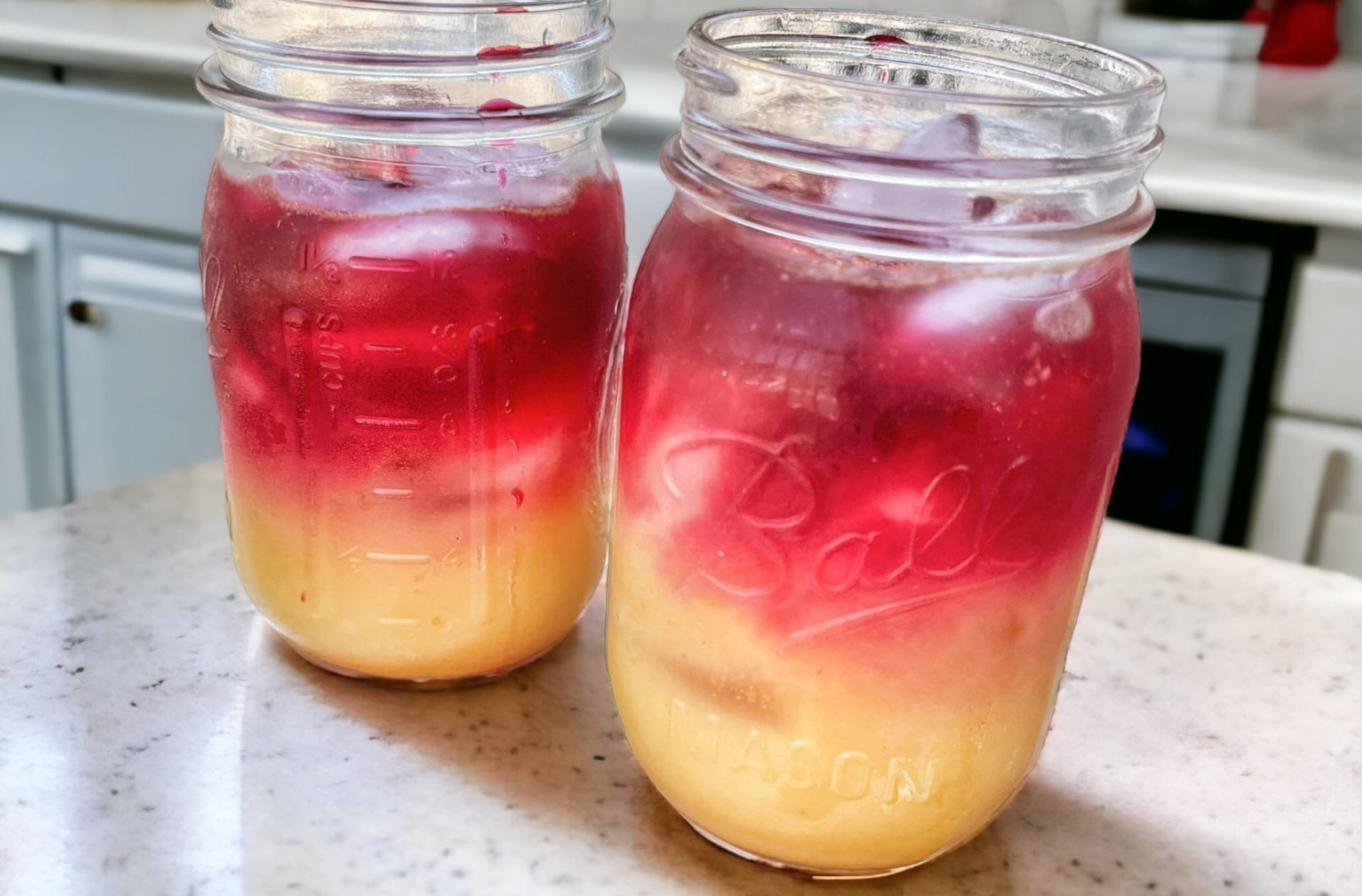 orange lemon beet juice cleanse in a jar on a counter