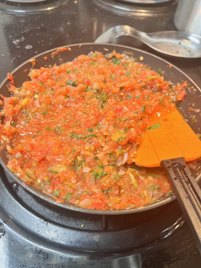 fresh homemade salsa in a skillet on a stove